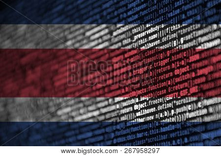 Costa Rica Flag  Is Depicted On The Screen With The Program Code. The Concept Of Modern Technology A