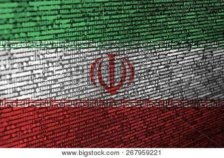 Iran Flag  Is Depicted On The Screen With The Program Code. The Concept Of Modern Technology And Sit