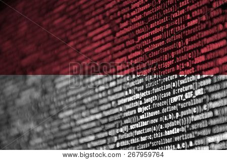 Monaco Flag  Is Depicted On The Screen With The Program Code. The Concept Of Modern Technology And S