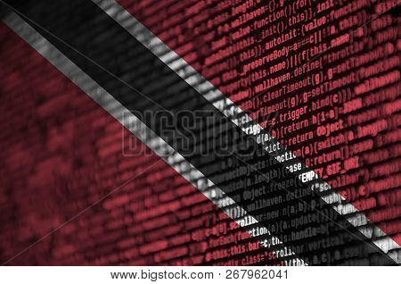 Trinidad And Tobago Flag  Is Depicted On The Screen With The Program Code. The Concept Of Modern Tec