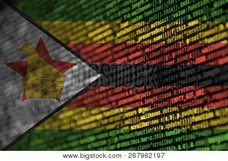 Zimbabwe Flag  Is Depicted On The Screen With The Program Code. The Concept Of Modern Technology And