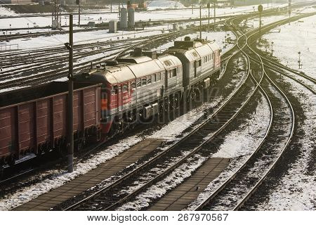 Rail Cars Loaded With Coal, A Train Transports Coal. Many Different Rail Cars.