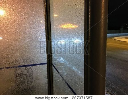 Edmonton, Canada - November 7th, 2018: Waiting For The Bus In The Frigid Cold Winter Early In The Mo