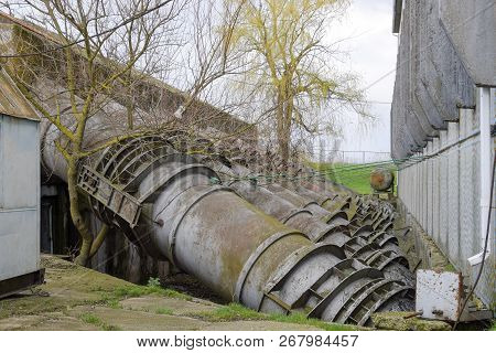 Outlet Pipes Of A Water Pumping Station. Pipes Of Large Diameter.