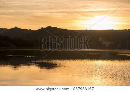 Sunset In The Ruidera Lagoons With The Golden Sky