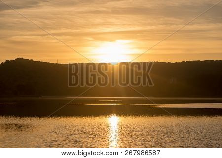 Sunset In The Ruidera Lagoons With The Golden Sky