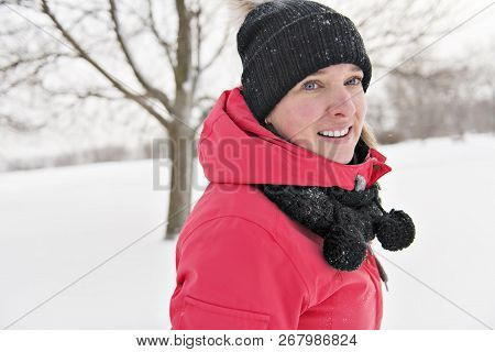 Nice Woman In Winter Outdoors Having Fun