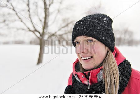 Nice Woman In Winter Outdoors Having Fun
