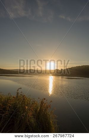 Sunset In The Ruidera Lagoons With The Golden Sky