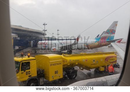 Moscow, Russia - 30 October 2019: Yellow Fuel Truck For Refueling An Airplane At A Russian Airport. 