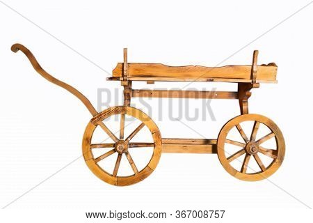 Conservative Ancient Wagon On White Background . Wooden Rustic Four-wheel Cart . Onion In Wooden Car