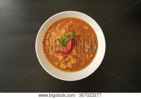 Famous Traditional Arabic Cuisine - Peeled Fava Beans With Chili In White Bowl On Dark Wooden Backgr