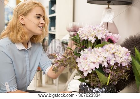 Woman Shopping At Homeware Store