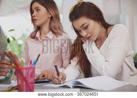 Females, Equality, Success Concept. Beautiful Cheerful Young Woman Taling To Her College Friends, En