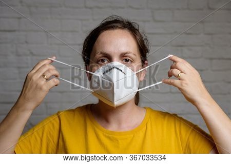Young Woman Wearing Kn-95 Protection Medical Mask. Prevention Of The Spread Of Virus And Epidemic, P