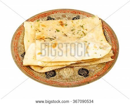 Indian Cuisine - Garlic Naan (garlicky Flatbread) On Brass Plate Isolated On White Background