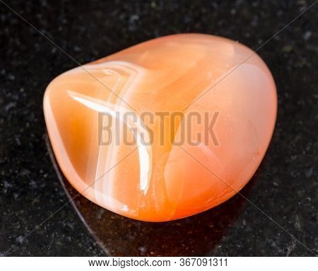 Closeup Of Sample Of Natural Mineral From Geological Collection - Rolled Carnelian (cornelian) Rock 