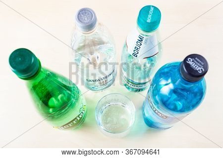 Moscow, Russia - May 10, 2020: Top View Of Various Plastic Bottles With Naturally Carbonated Mineral