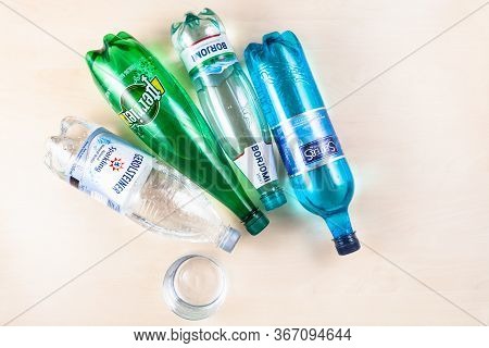 Moscow, Russia - May 10, 2020: Top View Of Various Lying Plastic Bottles With Naturally Carbonated M