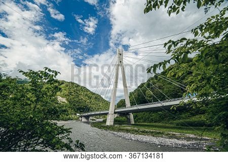 Cable-stayed Bridge Expressway Among The Mountains. Mountain River