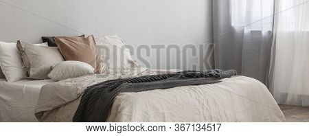 Elegant Bedroom Interior With King Size Bed In Fashionable Apartment, Real Photo