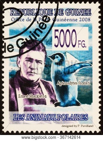 Moscow, Russia - May 20, 2020: Stamp Printed In Guinea Shows Portrait Of Ernest Shackleton (1874-192