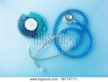 asthma inhaler stethoscope medicine through water drop background. medical treatment