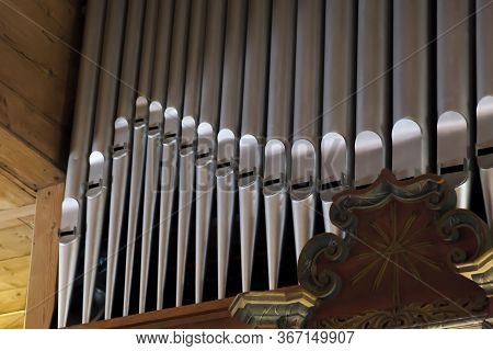 Pipe Organ Frontal Shot, Shiny Silver Prospect Pipes Pattern, Row Closeup. Sacral Music, Church Musi