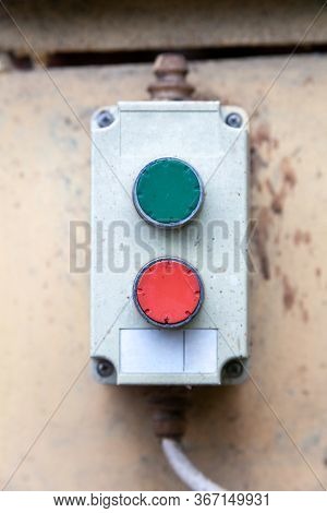Two Green And Red Buttons Remote, Industrial Machinery Operation Pad Frontal Shot, Closeup. On And O