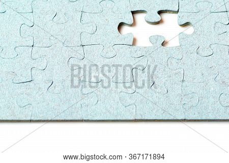 Missing Puzzle Piece. Business Creativity, Teamwork And Solution Concept. White Background.