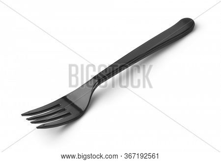 Disposable black plastic fork isolated on white
