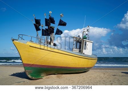 Fishing Boat On The Beach Of The Polish Baltic Coast Near Rewal