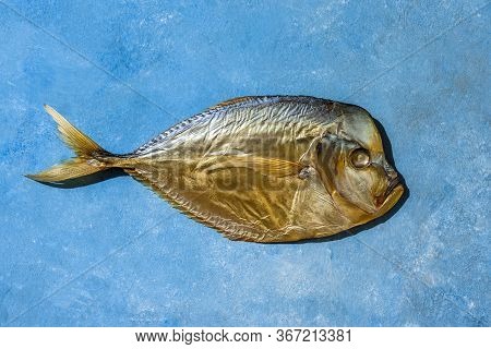 Smoked Oceanic Fish Vomer Selena On A Blue Background. Top View.