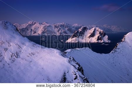 Wiinter Mosken Island With Main Lofoten In Background At Sunset, Norway