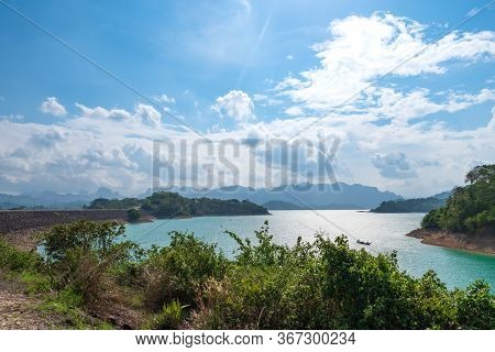 Scenic Landscape Of Big River And Reservoir Dam With Mountain And Nature Forest