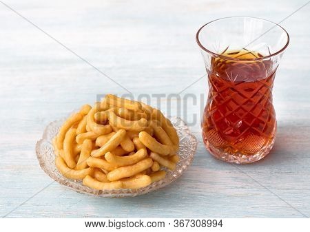 Chak Chak, Pieces Of Dough In Honey, Tatar Traditional Dessert On Light Blue Background