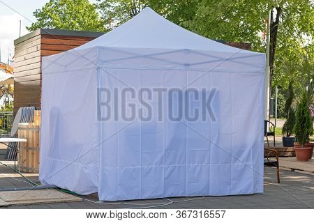 White Canopy Gazebo Tent At Garden Patio