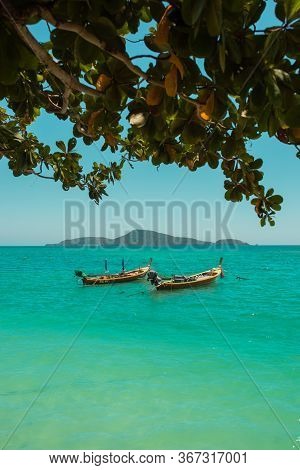 Exotic Islands. Boats Stand In Azure Water Near The Shore. Phuket, Thailand