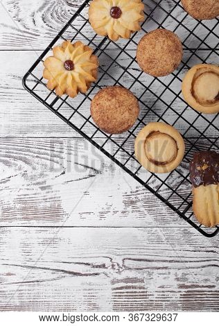 Shortbread Cookie Assortment On The Pastry Lattice On The White Wooden Table. Top View