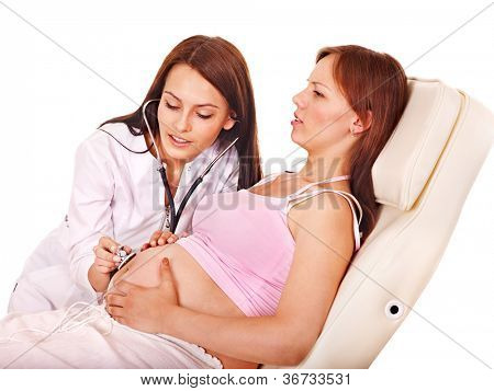 Donna incinta con il medico. Isolato.