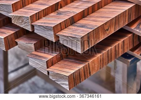 Joinery. Wood Veneer Wall Panels Elements Are Covered With Dust. Rosewood Reconstituted Veneer. Furn