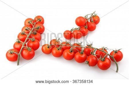 Fresh Organic Cherry Tomatoes Isolated On White Background. The Cherry Tomato Is Regarded As A Botan