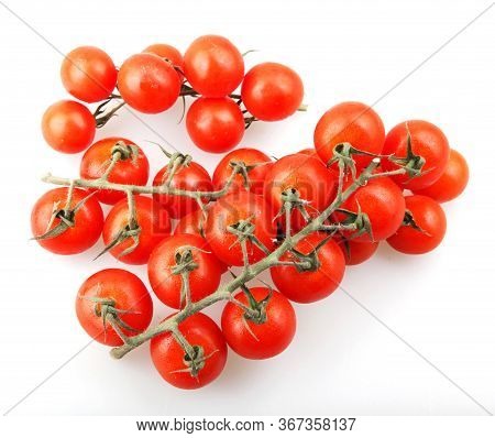 Fresh Organic Cherry Tomatoes Isolated On White Background. The Cherry Tomato Is Regarded As A Botan