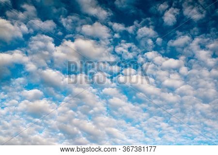 Blue Sky Background With White Clouds. Beautiful Cloud Scape. Altocumulus Clouds