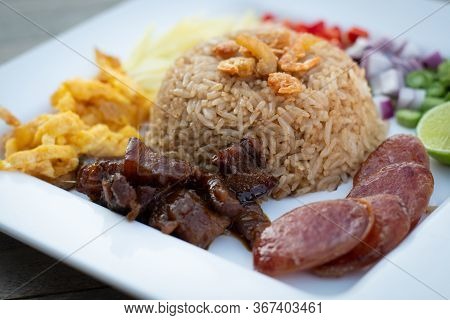 Thai Food - Kao Cluk Ka Pi (mixed Cooked Rice With Shrimp Paste Sauce) On White Round Dish. Fried Ri