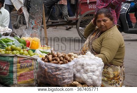 Delhi, India - March 14, 2019: A Fruit And Vegetable Wallah At The Spice Market Of Chandni Chowk