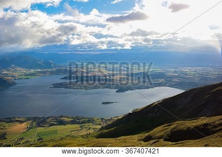 Panoramic Top View Landscape, Blue Water Mountain And Sky Background