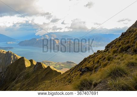 Panoramic Top View Landscape, Blue Water Mountain And Sky Background