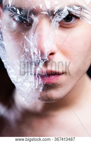 Plastic Recycle Reuse Reduce. Plastic Fashion. Guy Handsome Face Cellophane Mask. Trash Concept. Pla