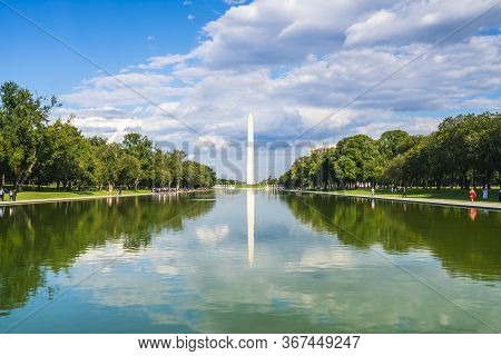 Washington Dc,washington Monument On Sunny Day With Blue Sky Background.